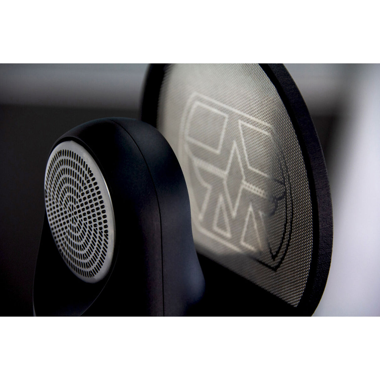 Aston Microphones Element side-fire cardioid studio microphone with active moving coil technology, unique capsule design, purple backlit badge, shock mount, and pop filter