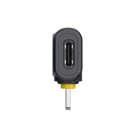 Hollyland Lark M2 shine charcoal Lightning receiver dongle side view: black USB-C to Lightning adapter with USB-C port and yellow Lightning plug extended, compact design for dual-channel wireless lavalier audio on iOS devices
