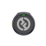 Hollyland Lark M2 shine charcoal TX wireless lavalier transmitter top view: round black clip-on mic with yellow power button, two green status LEDs, centered Hollyland logo, compact design for dual-channel 2.4GHz wireless audio system