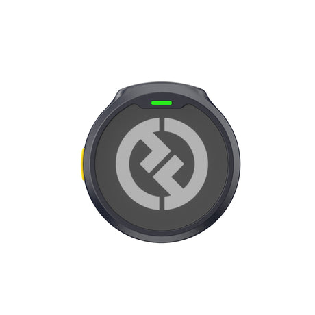 Hollyland Lark M2 shine charcoal TX wireless lavalier transmitter top view: round black clip-on mic with yellow power button, two green status LEDs, centered Hollyland logo, compact design for dual-channel 2.4GHz wireless audio system