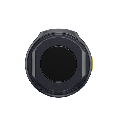 Hollyland Lark M2 shine charcoal TX wireless lavalier transmitter front view: round black clip-on unit with black omnidirectional mic capsule, yellow power button at edge, slim bezel design for discreet dual-channel wireless audio