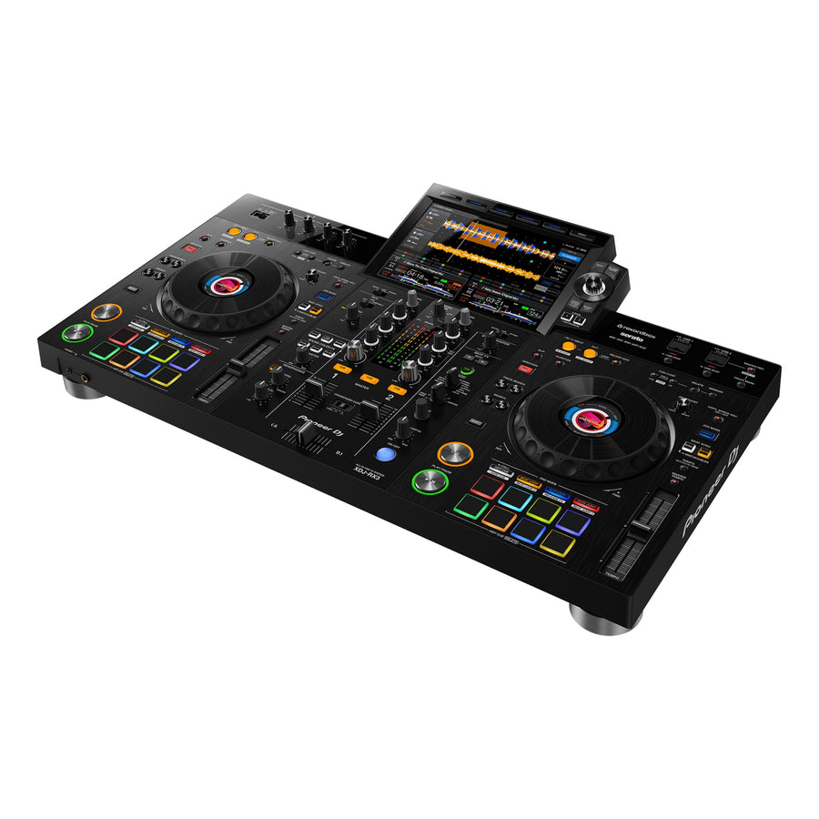 Angled view of the Pioneer DJ XDJ-RX3 2-channel all-in-one DJ system, showing its dual jog wheels, central mixer section with faders and knobs, colorful performance pads, and large 10.1-inch touchscreen displaying track waveforms and deck information