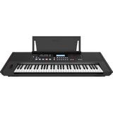 Roland E-X50 keyboard with built-in speakers and controls