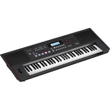 Roland E-X50 keyboard with built-in speakers and controls