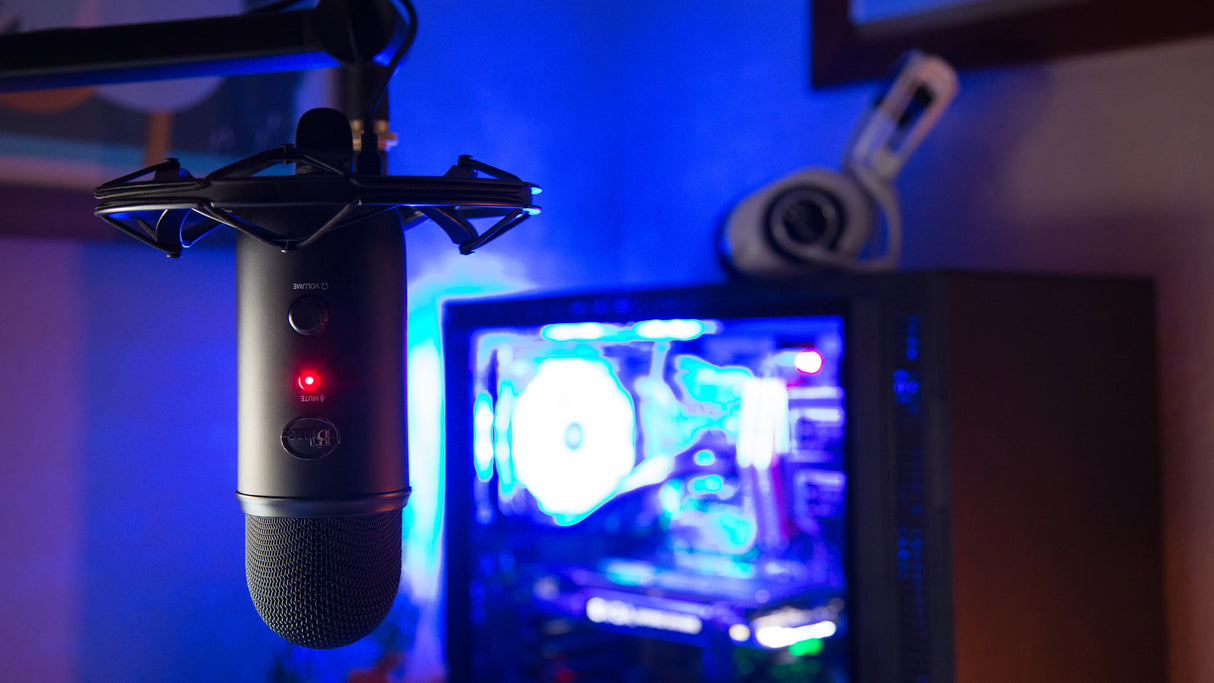 Blue Yeticaster Pro Streaming Bundle with Yeti USB microphone, Radius III shockmount, Compass boom arm, four pickup patterns, gain control, mute, and headphone output