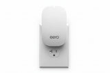 eero Beacon plug-in mesh WiFi extender installed in wall outlet expanding eero network coverage