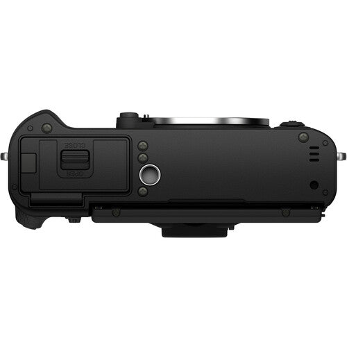 Bottom view of the black Fujifilm X-T30 II mirrorless camera body showing the vintage-style textured grip, X-mount lens port, and top-plate control dials