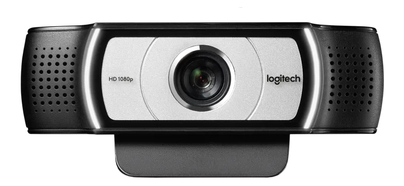 Logitech C930e HD webcam close-up showing lens, logo, and vented housing on black checkered background