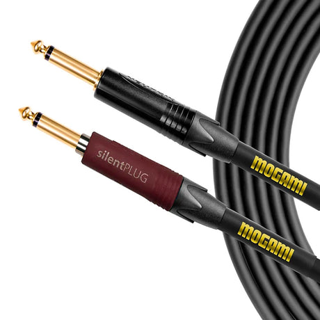 Mogami Gold INST SILENT S-18 instrument cable closeup: maroon Neutrik Silent plug (left) with "silent PLUG" label and black Neutrik straight 1/4-inch TS plug (right) on premium black shielded cable for guitar/bass with noise-free hot-swap