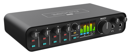 Side angled view of Black MOTU M6 6‑channel USB audio interface shown from the front, featuring four combo XLR/TRS mic/line/Hi‑Z inputs with individual gain knobs and 48V buttons, dual headphone outputs with volume controls, a central monitor volume knob and input/monitor mix knob, and a full‑color LCD level meter display across the top
