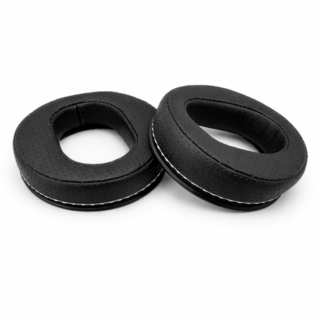 Two black earbud cushions on a white background