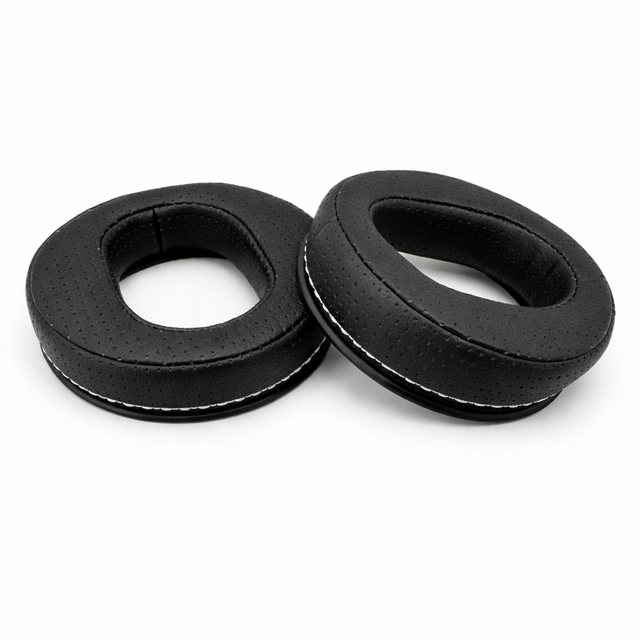 Two black earbud cushions on a white background