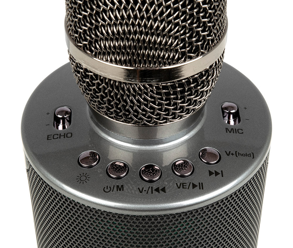 Close-up of the VocoPro Pop-Up-Oke control panel featuring chrome buttons for Echo, Mic volume, Power/Mode, LED light control, and playback navigation sitting atop the integrated mesh speaker