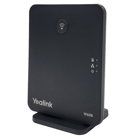 Front angled view of the Yealink W60B DECT IP base station in dark gray, displaying the wireless signal icon, power lock and signal strength green LEDs, power LED, and model label on a white background