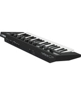 side view of Yamaha reface CP mini vintage keyboard with 37 keys and effects knobs