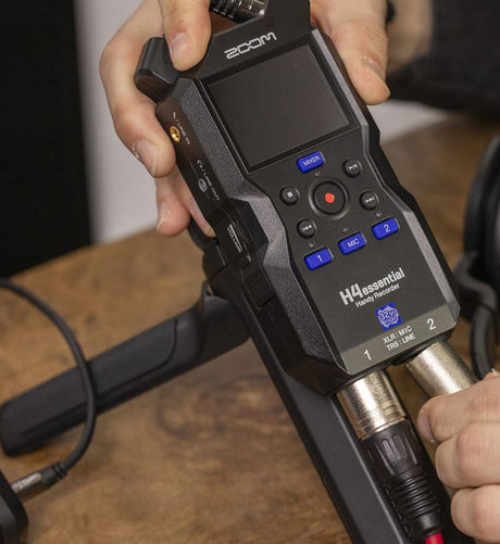 Zoom H4essential 4-track 32-bit portable recorder with X/Y stereo microphones, two XLR/TRS inputs, 130 dB SPL capture, USB-C interface mode, color LCD, and SDXC support