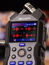Zoom H4essential 4-track 32-bit portable recorder with X/Y stereo microphones, two XLR/TRS inputs, 130 dB SPL capture, USB-C interface mode, color LCD, and SDXC support